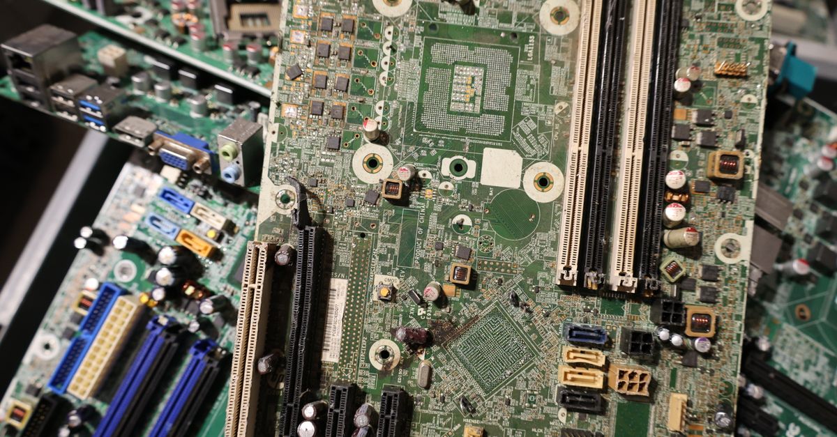 A collection of old circuit boards showcasing electronic waste and recycling possibilities.
